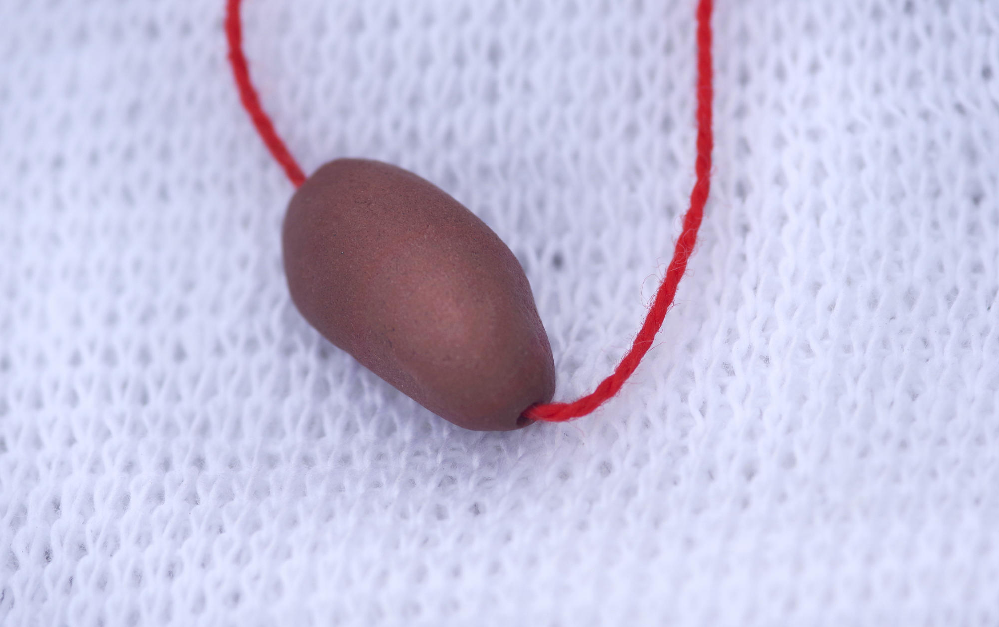 coral bead on string